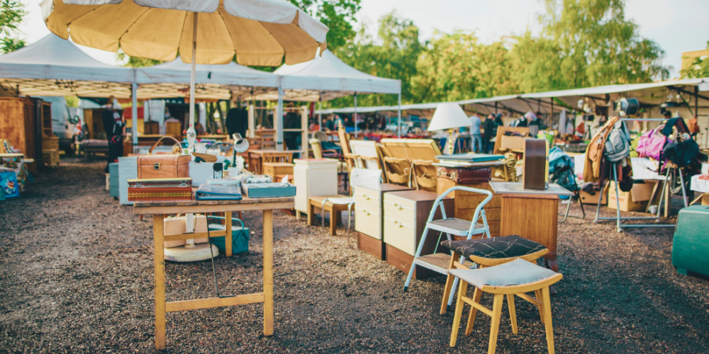 Outdoor flea market with thrifted home decor 2