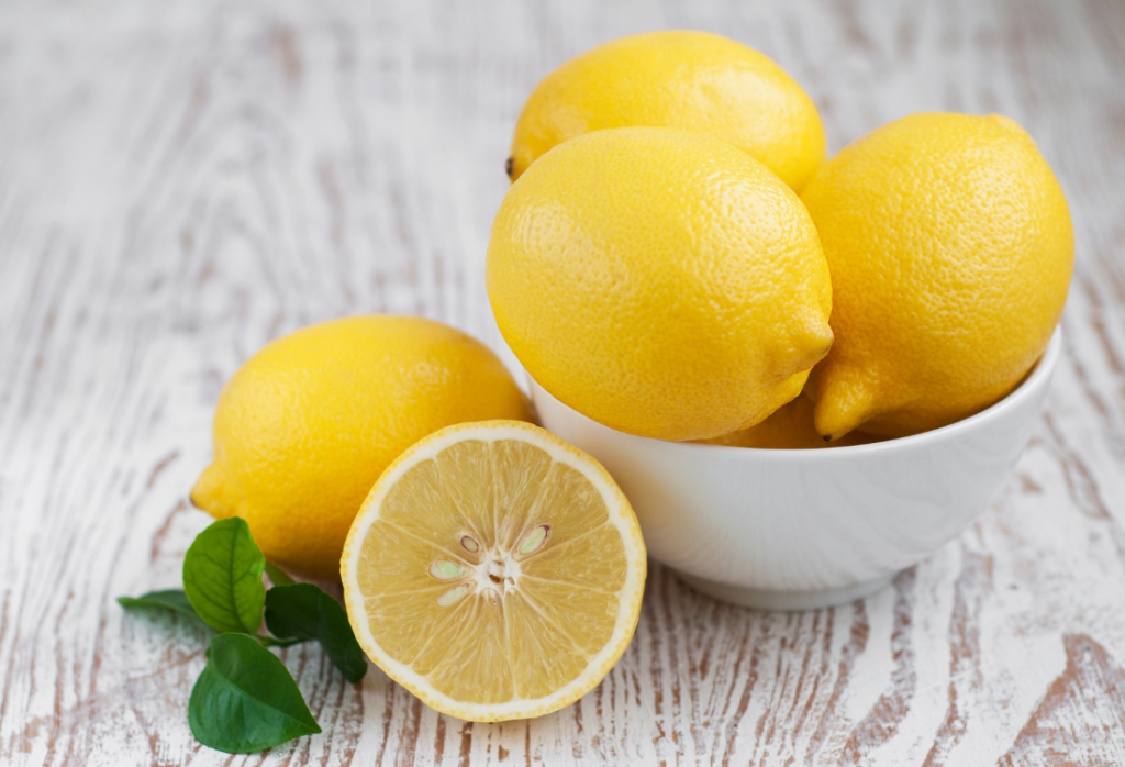 Lemons in a white bowl for summer theme idea