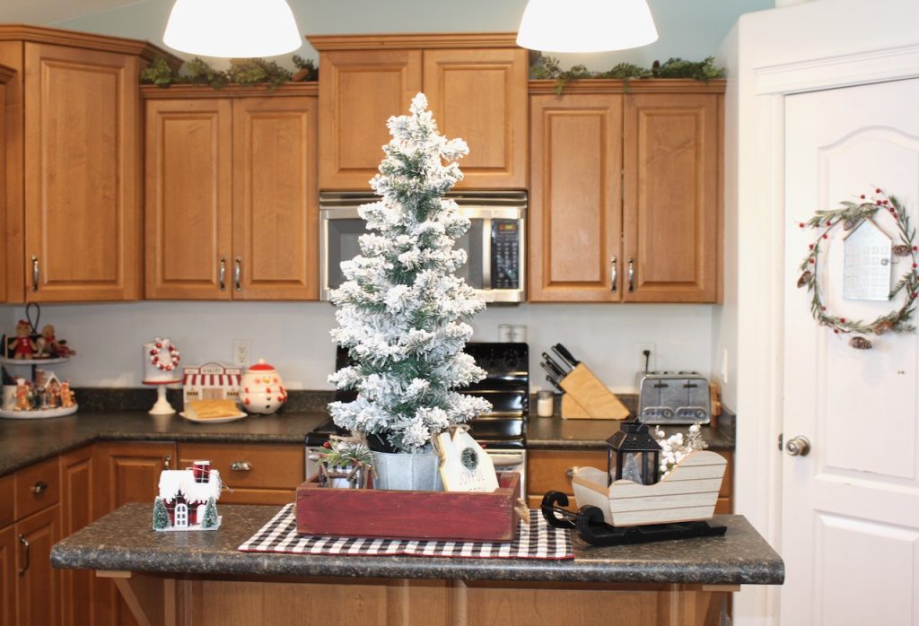 Christmas decorated kitchen in red, white and black colours