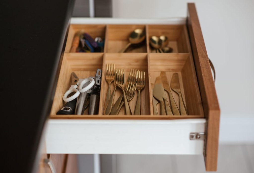 organized cutlery drawer at home
