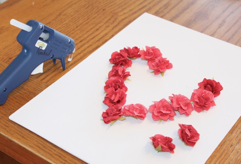 making DIY canvas art with roses